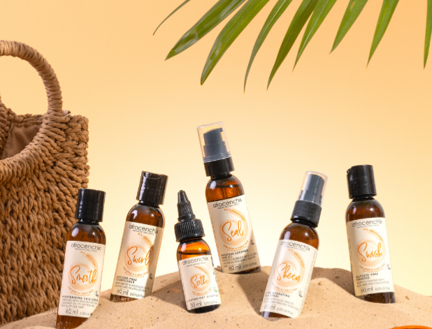 Collection of skincare bottles with a beach background